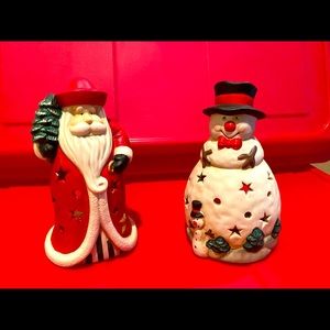Santa and Snowman candle holders.